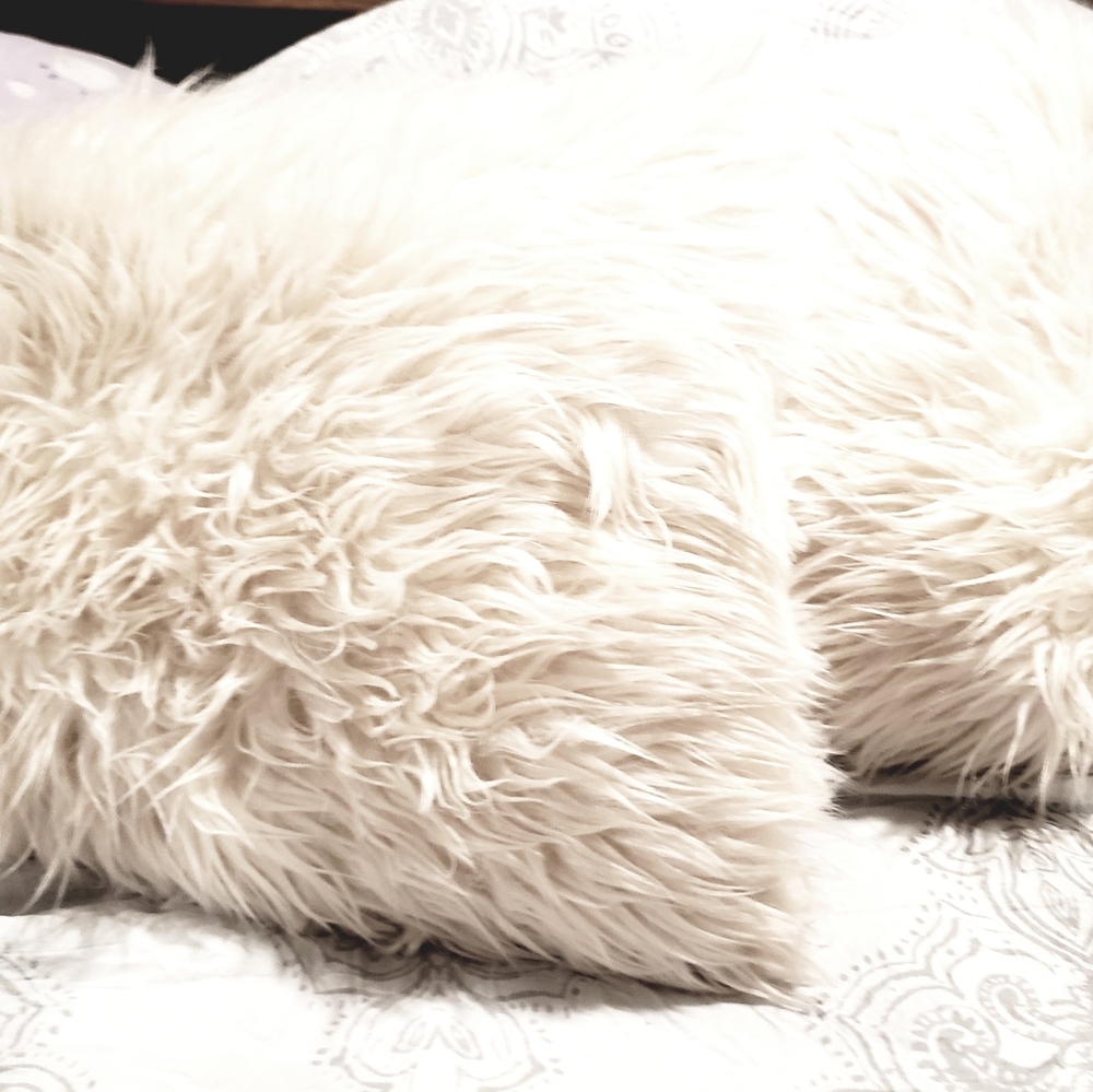White Faux fur throw pillows